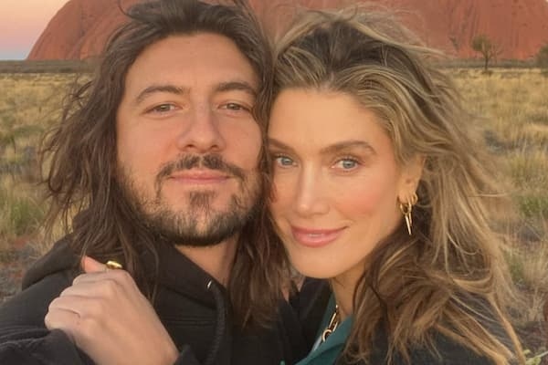 Singer Matthew Copley and his girlfriend Delta Goodrem Photo